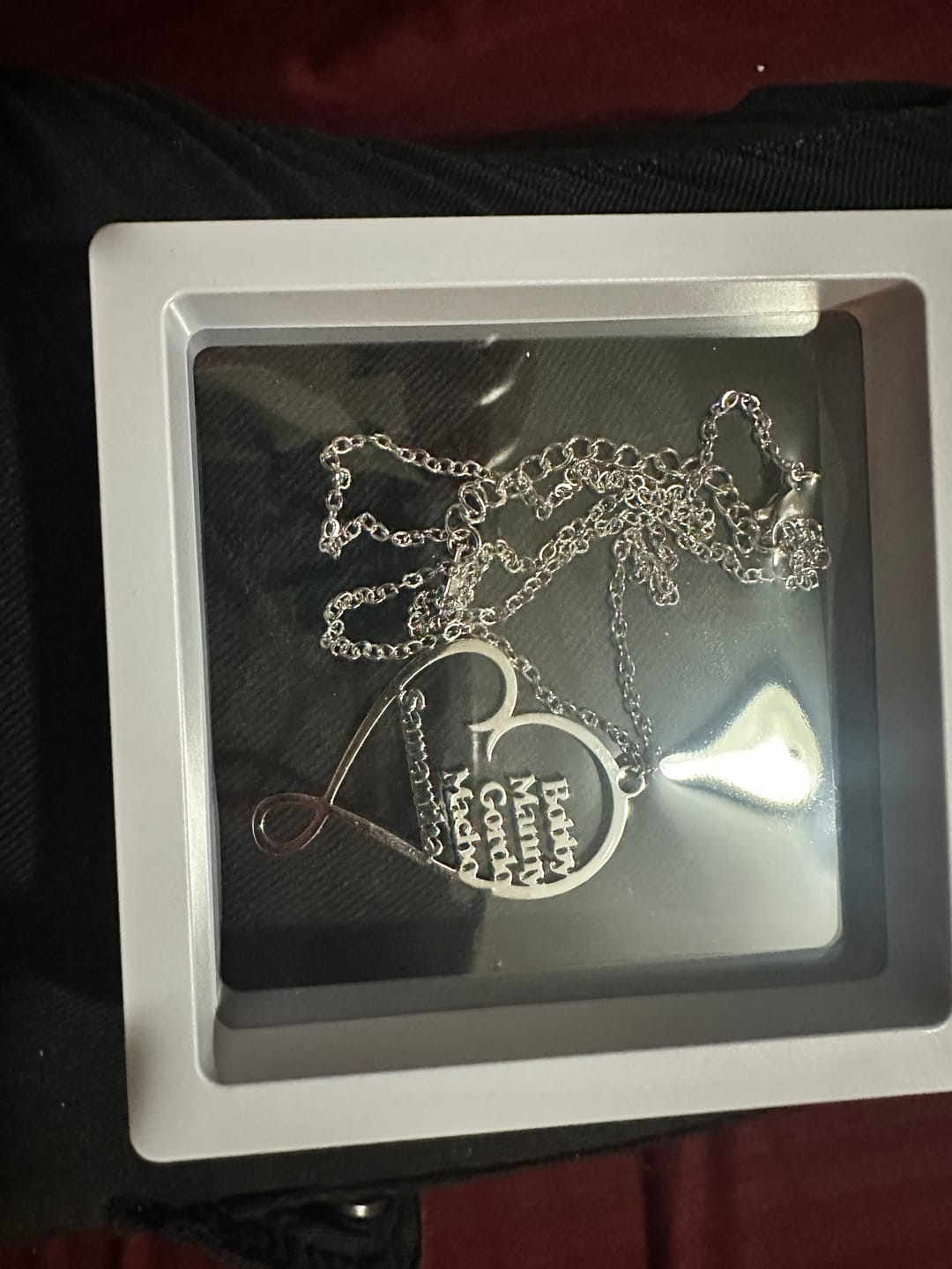 Customer photo review of Family Name Heart Necklace
