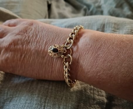 Customer photo review of Stunning 9CT Yellow Gold Single Stone Garnet Padlock Pendant