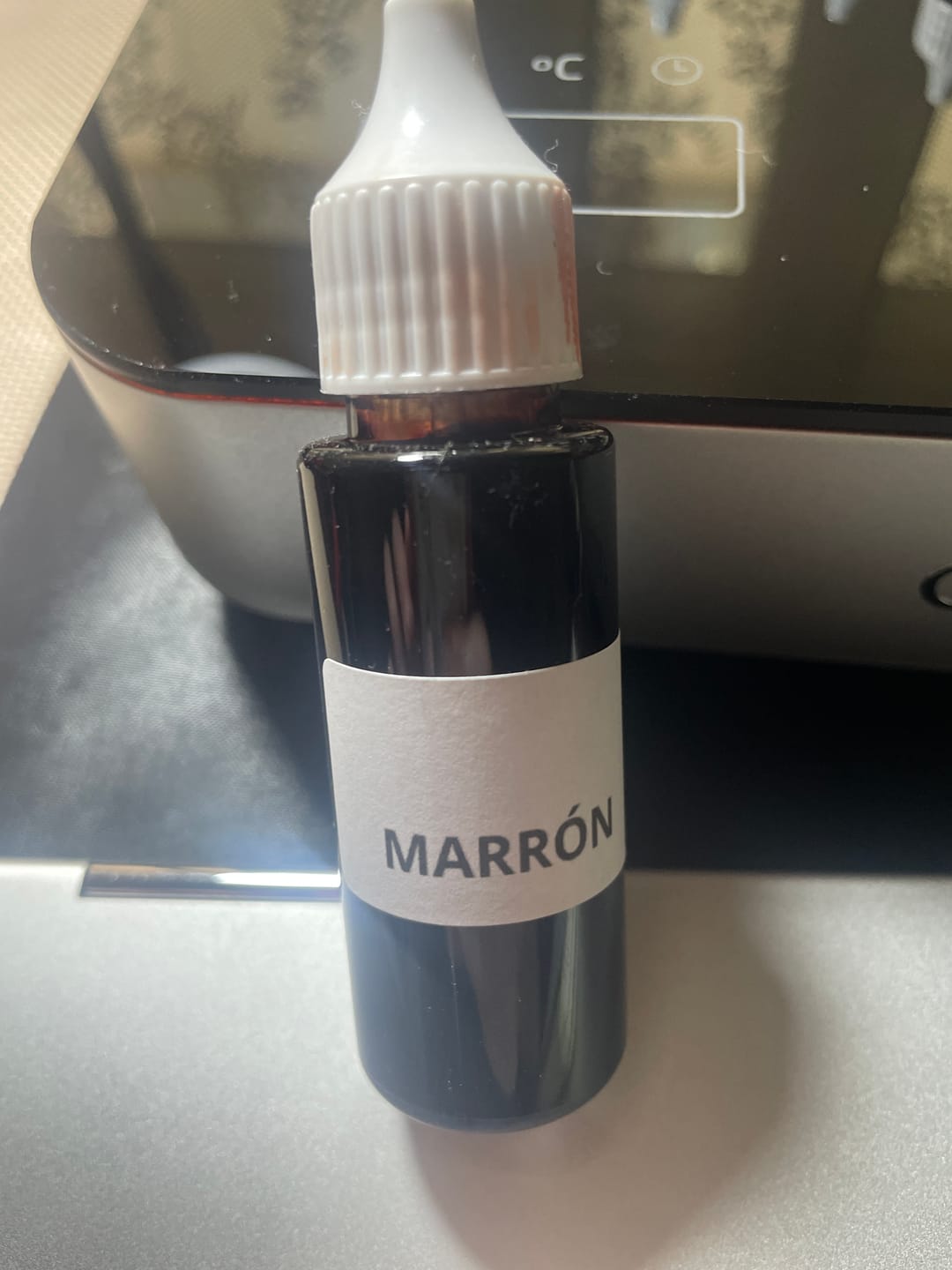 Customer photo review of Colorante líquido para velas MARRÓN