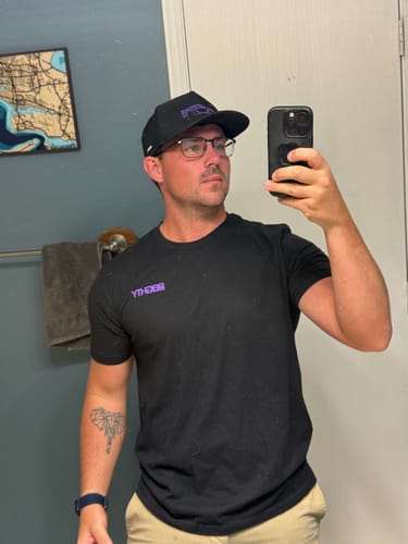Customer taking a selfie in a mirror while wearing the black 80Eighty DCG88 hat.