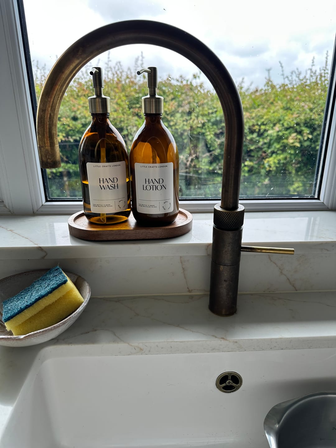 Customer photo review of Set of 2 Amber Glass Bottle 500 ML with Metal Pump & Small Tray