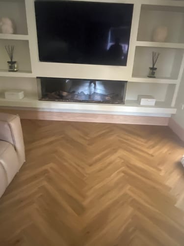 Reviewer's two Sable Onyx diffusers looking amazing on a fireplace surround.