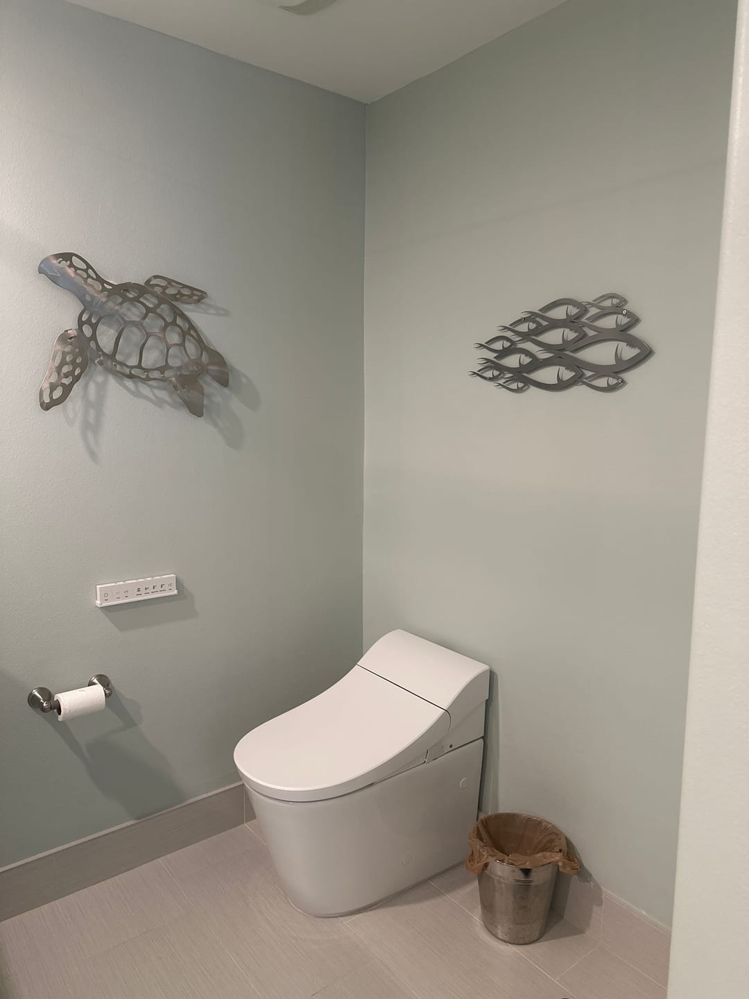 Customer photo review of School Of Fish Metal Wall Decor
