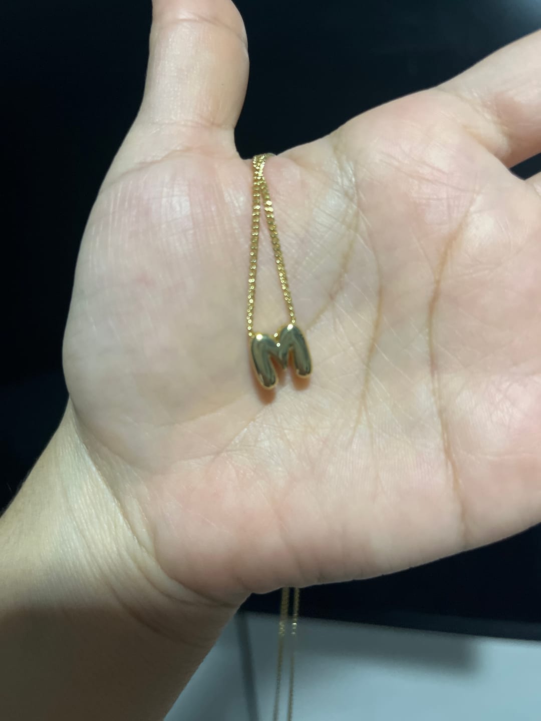 Customer photo review of Personaliza Tu Collar Con Inicial Mini Bubble Dorado