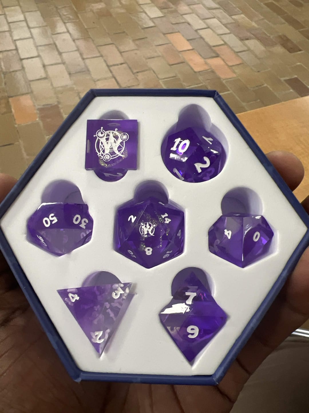 Customer photo review of PRE-ORDER | Sharp-Edged Resin Dice Set | Wizard101 x Misty Mountain Gaming