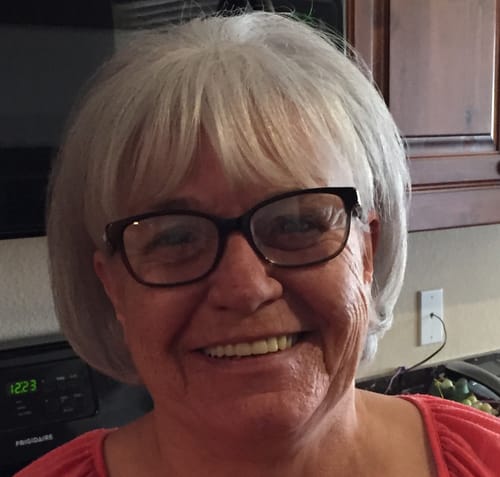 Close-up of a smiling reviewer for Koriderm Time Reverse Cream.