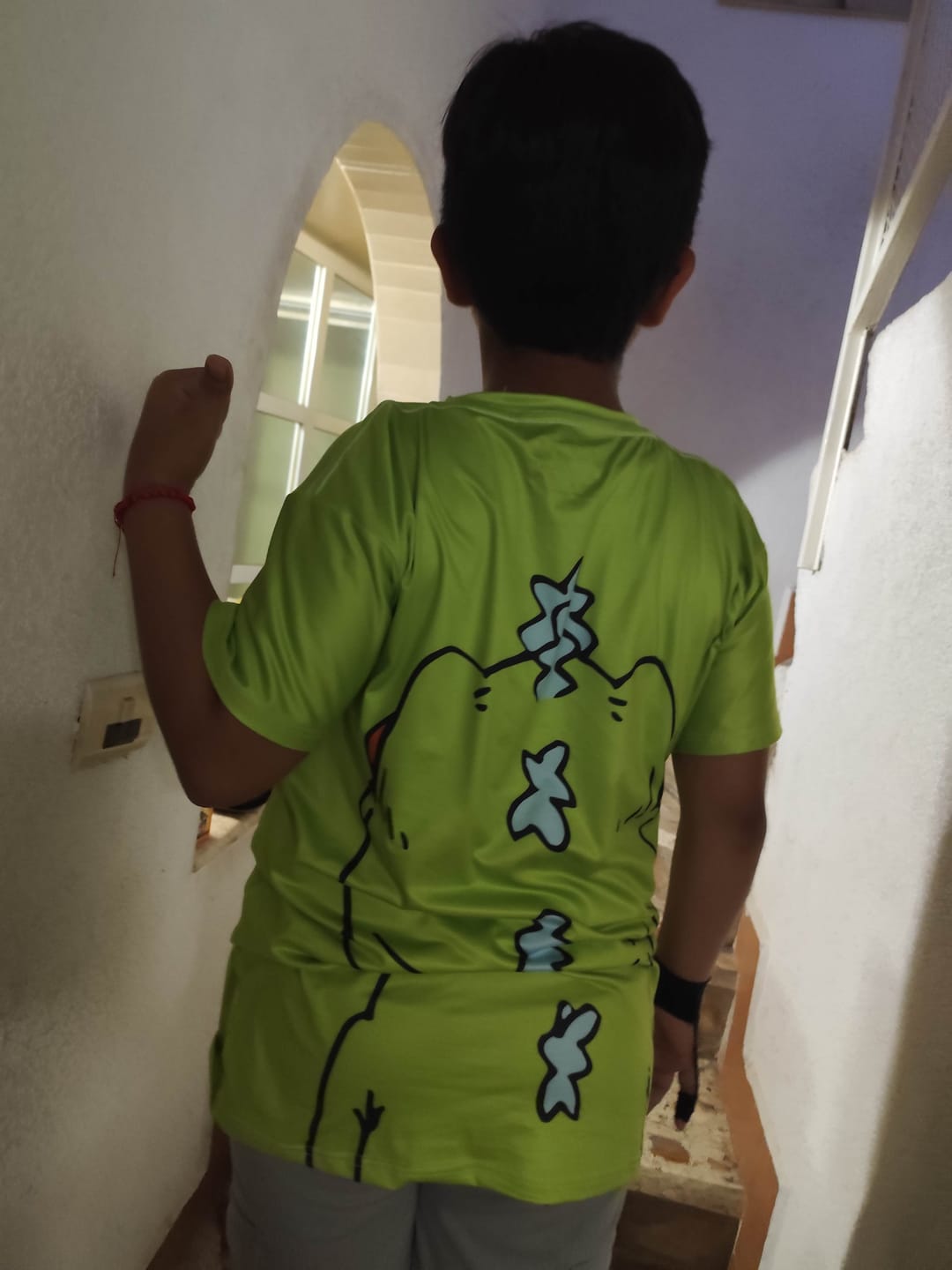 Customer photo review of Playera Pijama Reptar Oficial