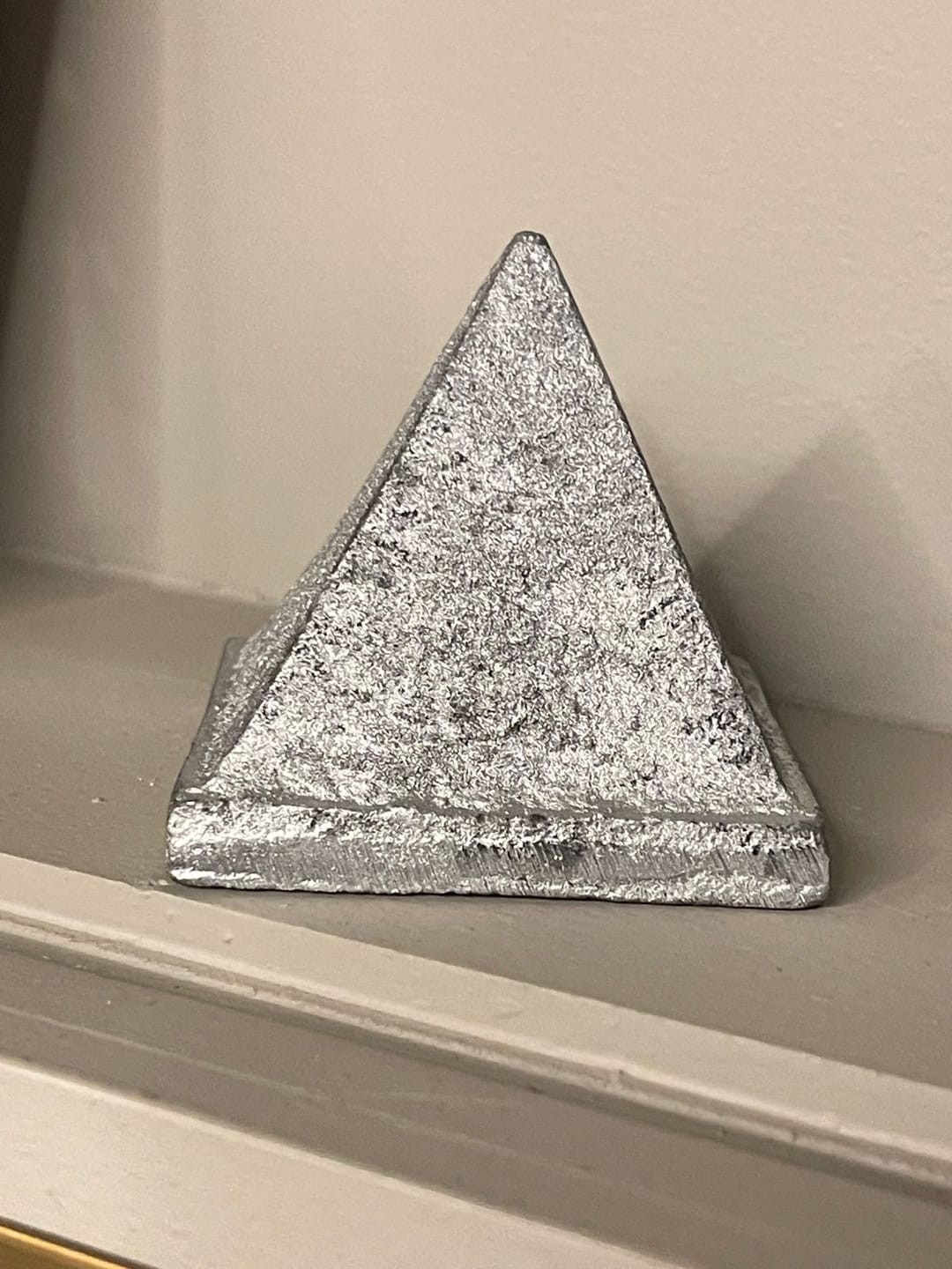 Customer photo review of Solid Iron Metal Pyramid Vastu Remedy for West Direction and Brahmasthan Balance, Mental Focus, Career Success and Positive Energy Correction | 6.5 cm | 615 g