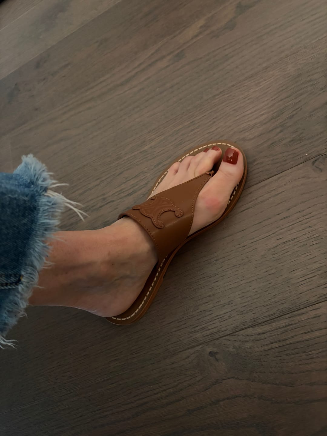 Customer photo review of WOMEN TRIOMPHE FLAT THONG IN CALFSKIN DARK BROWN