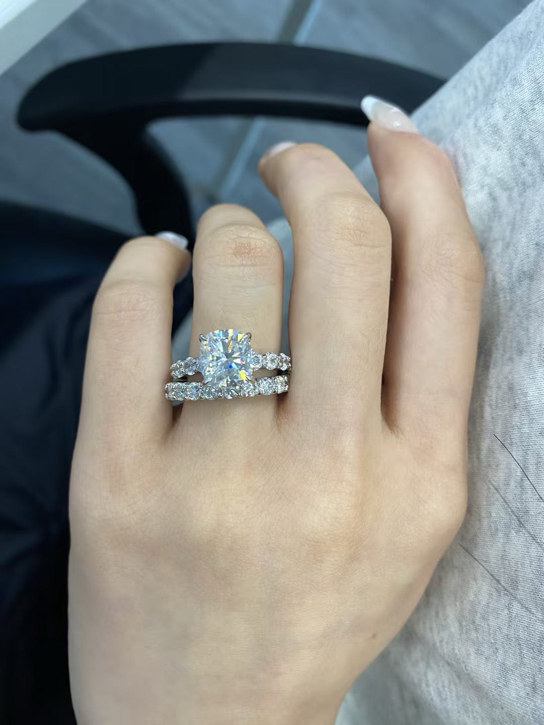 Customer photo review of Rodiffy Moissanite 3.0Ct Cushion Cut Side Stone White Gold Engagement Ring with Pavé Eternity Ring