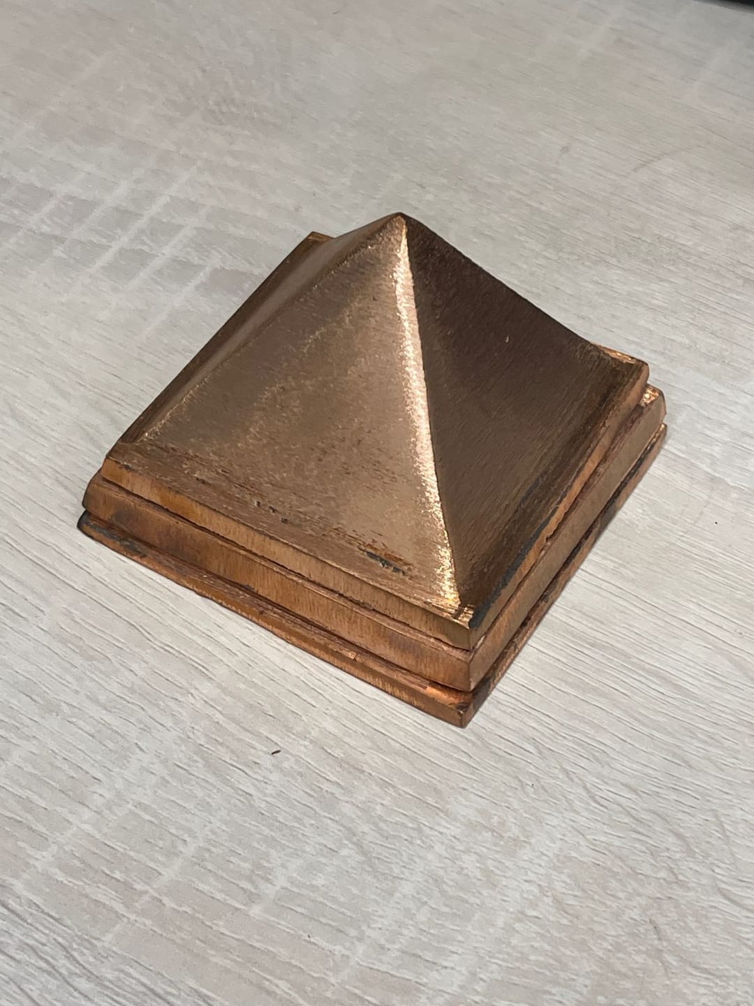 Customer photo review of 3-Layer Copper Pyramid Vastu Remedy for Energy Amplification, Prosperity and South East Direction Activation for Home, Office and Vastu Correction | 5-7.6 cm | 665 g
