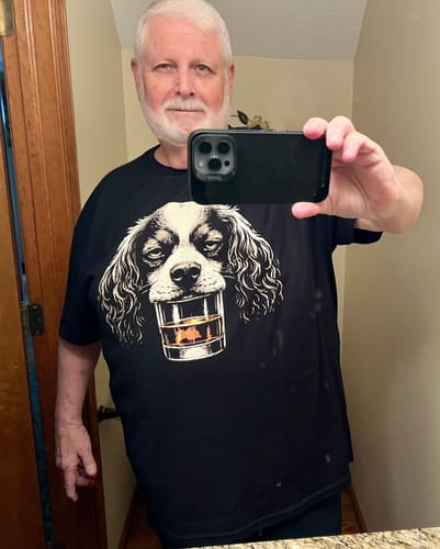 Reviewer taking a selfie while wearing the black Whiskey Dog Cavalier King Charles Spaniel T-Shirt.