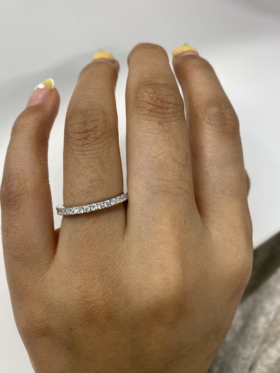 Customer photo review of S925 Half Halo Moissanite 0.5 Ct Round Cut White/Green Stone Anniversary Ring