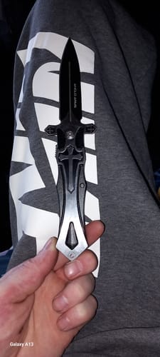 Customer photo review of Crucifix Symbol Lock Knife