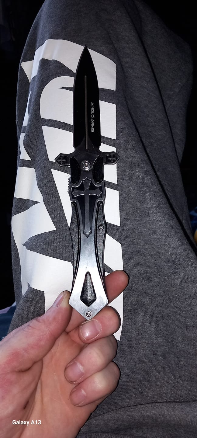 Customer photo review of Crucifix Symbol Lock Knife