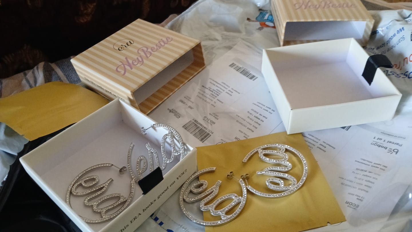 Customer photo review of Silver Luxe Logo Hoops