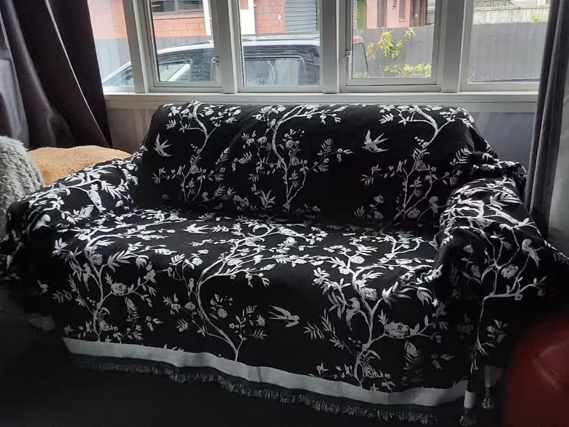 Customer photo review of Chenille Sofa Cover – Floral Jacquard Throw with Tassel Detail