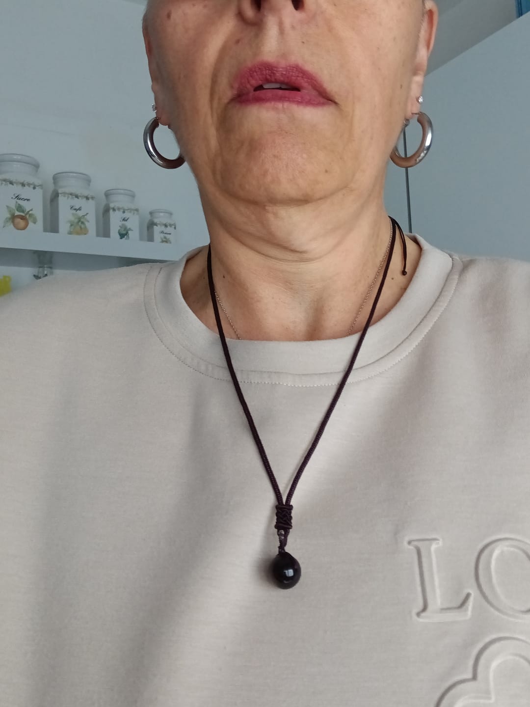 Customer photo review of Pendentif "Sphère" en Obsidienne Dorée
