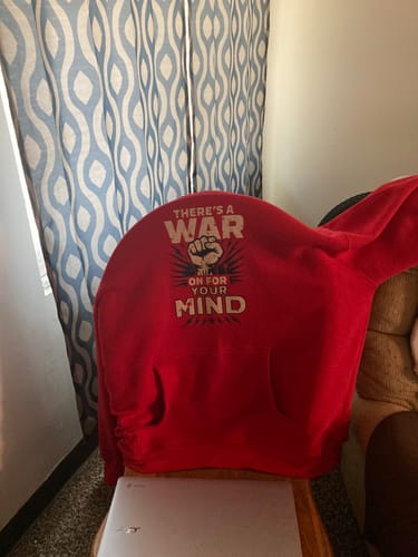 Customer photo review of There's A War On For Your Mind Hoodie