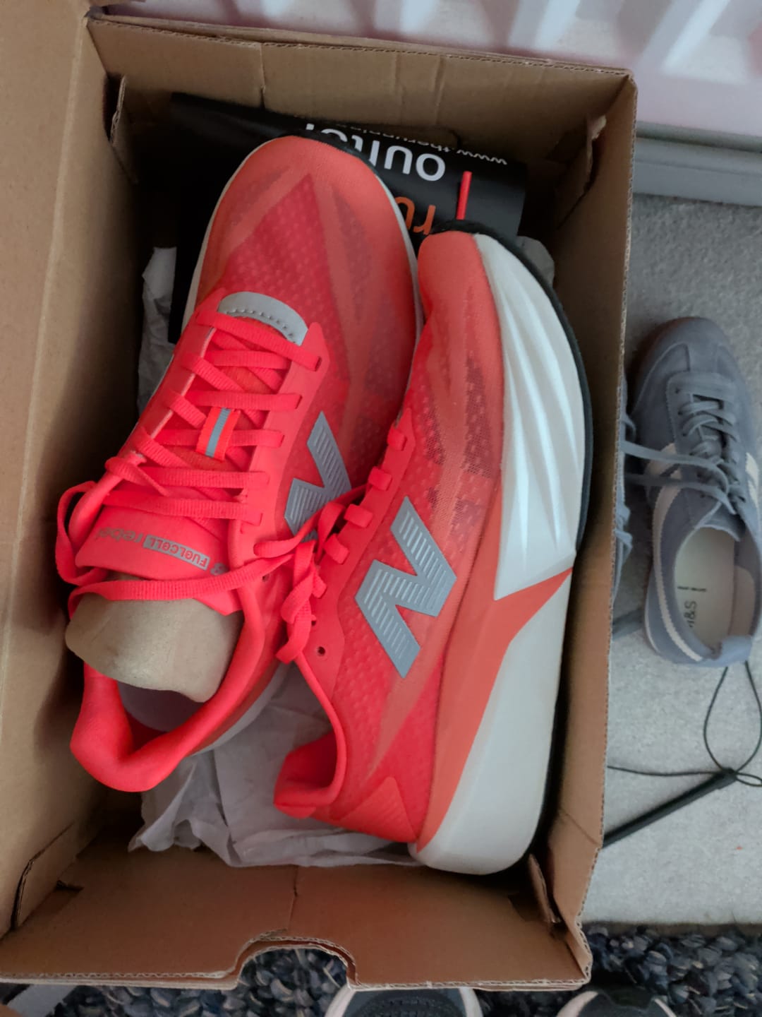 Customer photo review of New Balance FuelCell Rebel v5 Women's Running Shoe - Urgent Red/NB White/Silver