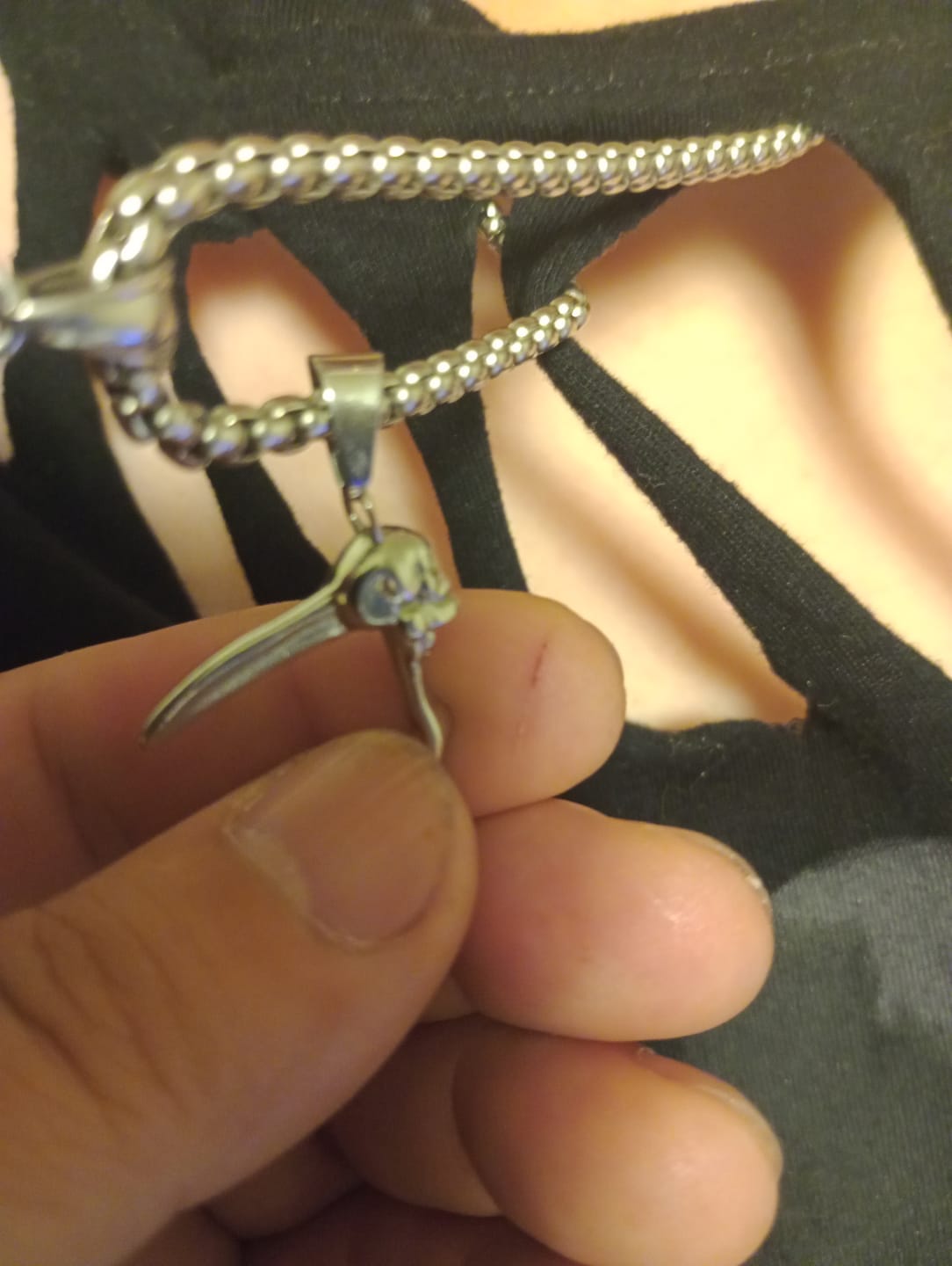 Customer photo review of SCYTHE SKULL PENDANT