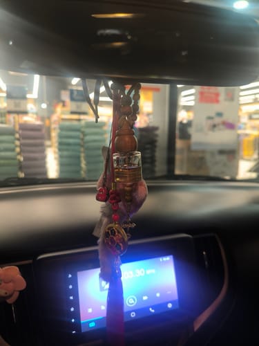 Reseña con foto de un cliente sobre Aromatizador De Auto