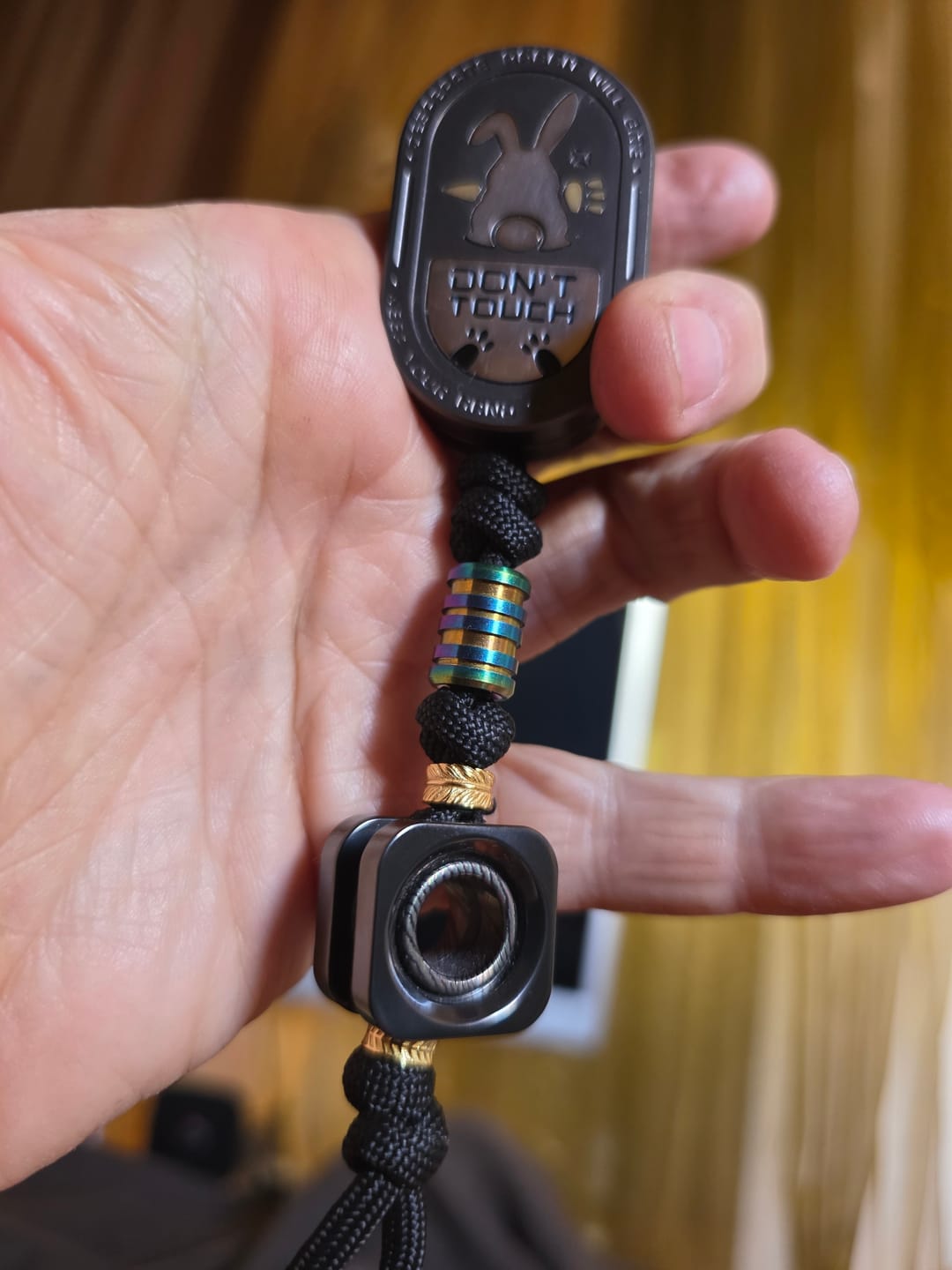 Customer photo review of Lautie WORMHOLE Knife Bead Pendant