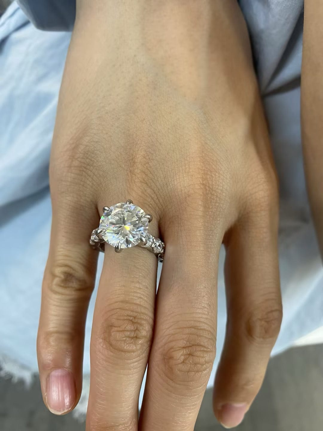 Customer photo review of S925 Moissanite 6.0Ct Round Cut Luxe Engagement Ring in Sterling Silver