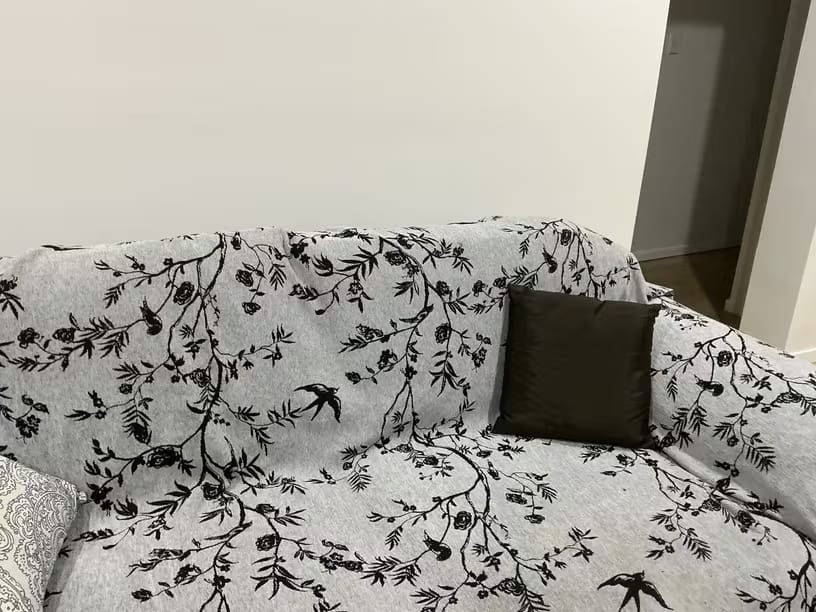 Customer photo review of Chenille Sofa Cover – Floral Jacquard Throw with Tassel Detail