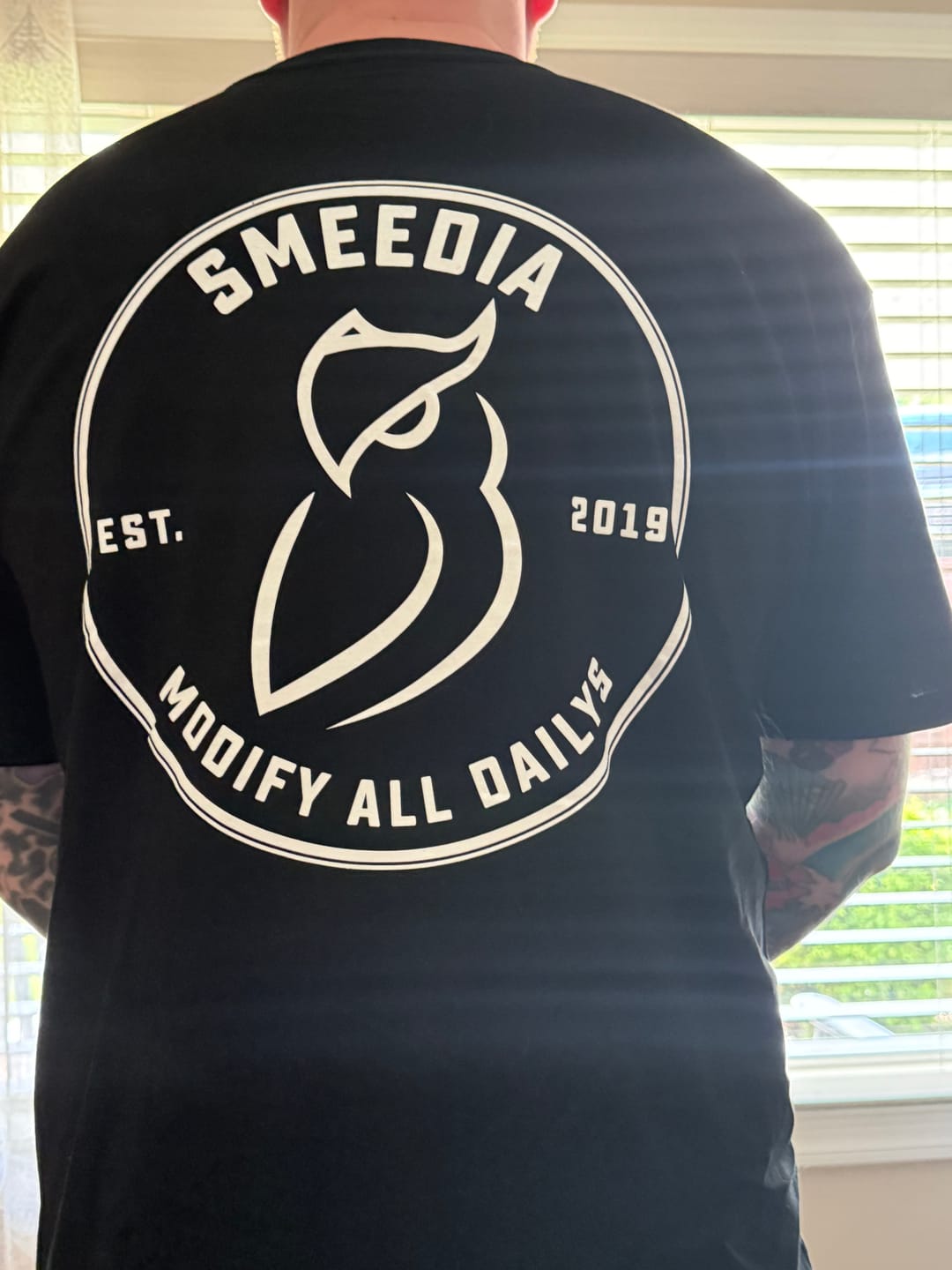 Customer photo review of Modify All Daily's Tee