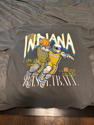Customer showing the back of the grey Indiana Dunkman T-Shirt with its large, detailed graphic.
