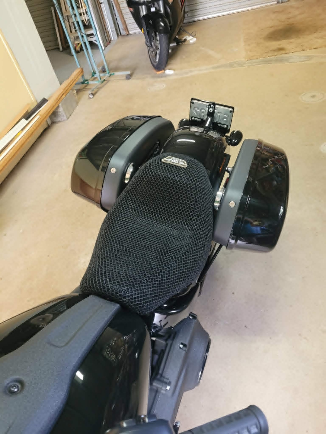 Wind Rider 3D mesh seat cover fitted over the seat of a metric cruiser, full bike visible