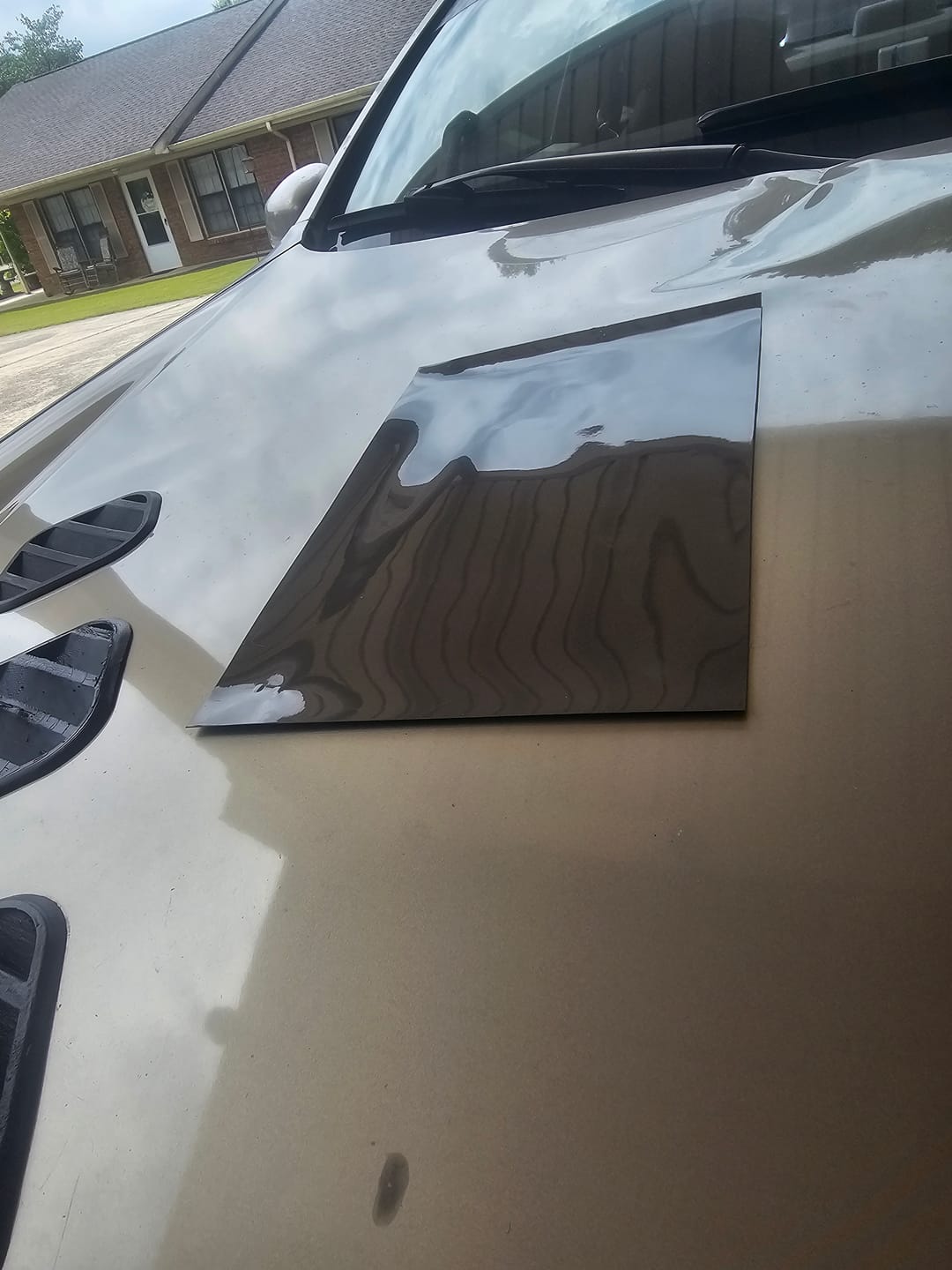 Customer photo review of Glossy Metallic Bernina Gray Vinyl Wrap