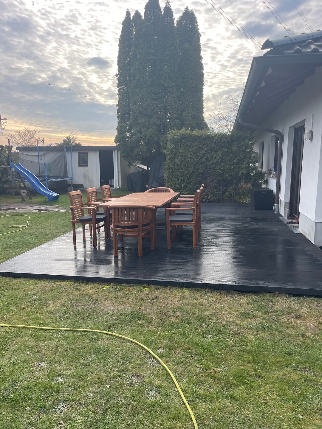 Customer photo review of Teak garden furniture 180-240cm extendable table 4cm top (6 Oxford stacking chairs 2 San Francisco chairs) including cushions.