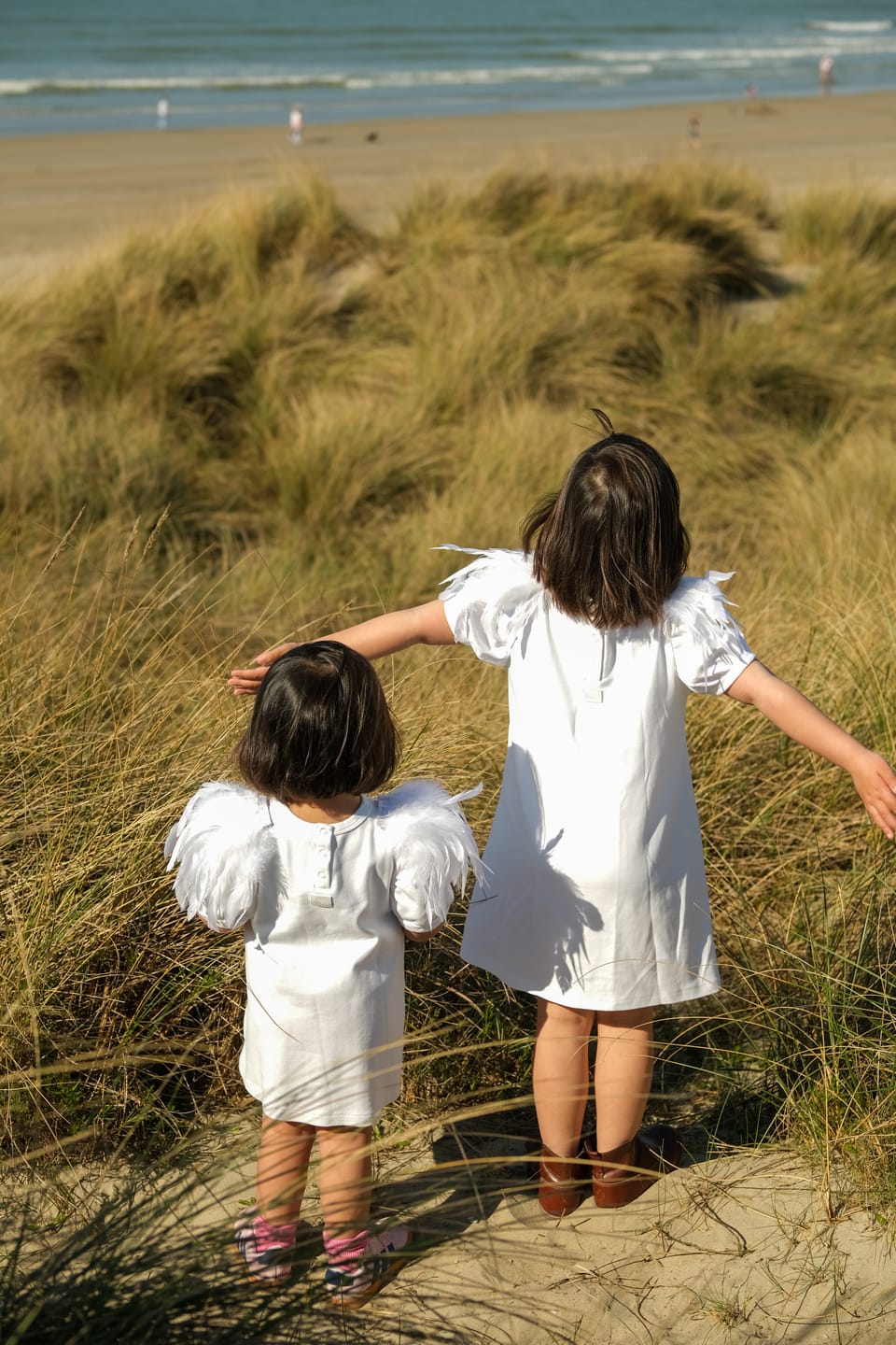 Customer photo review of The Tiny Feathers Dress