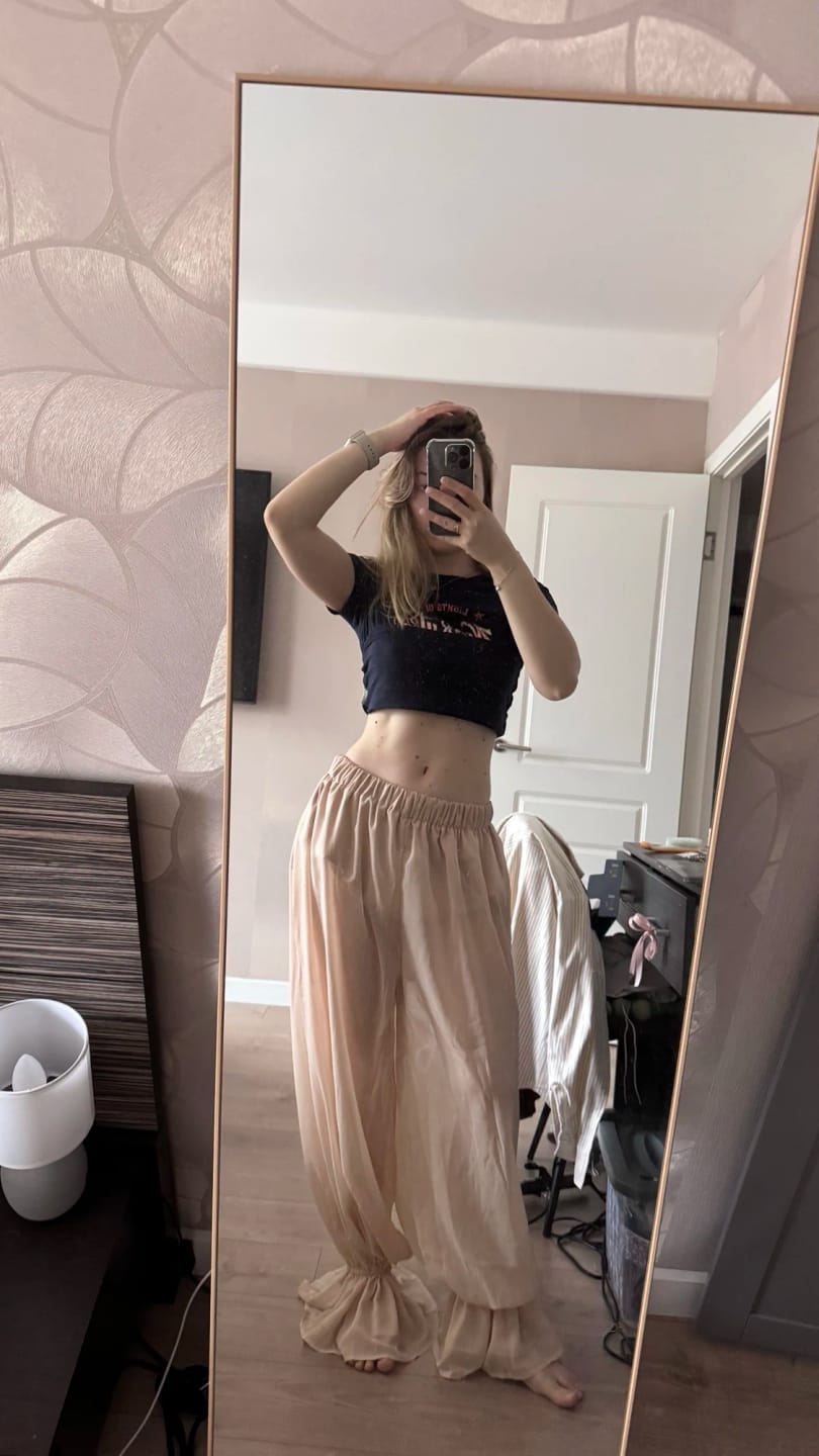 Customer photo review of Beatrice Sheer Elastic Waist Flare Trousers