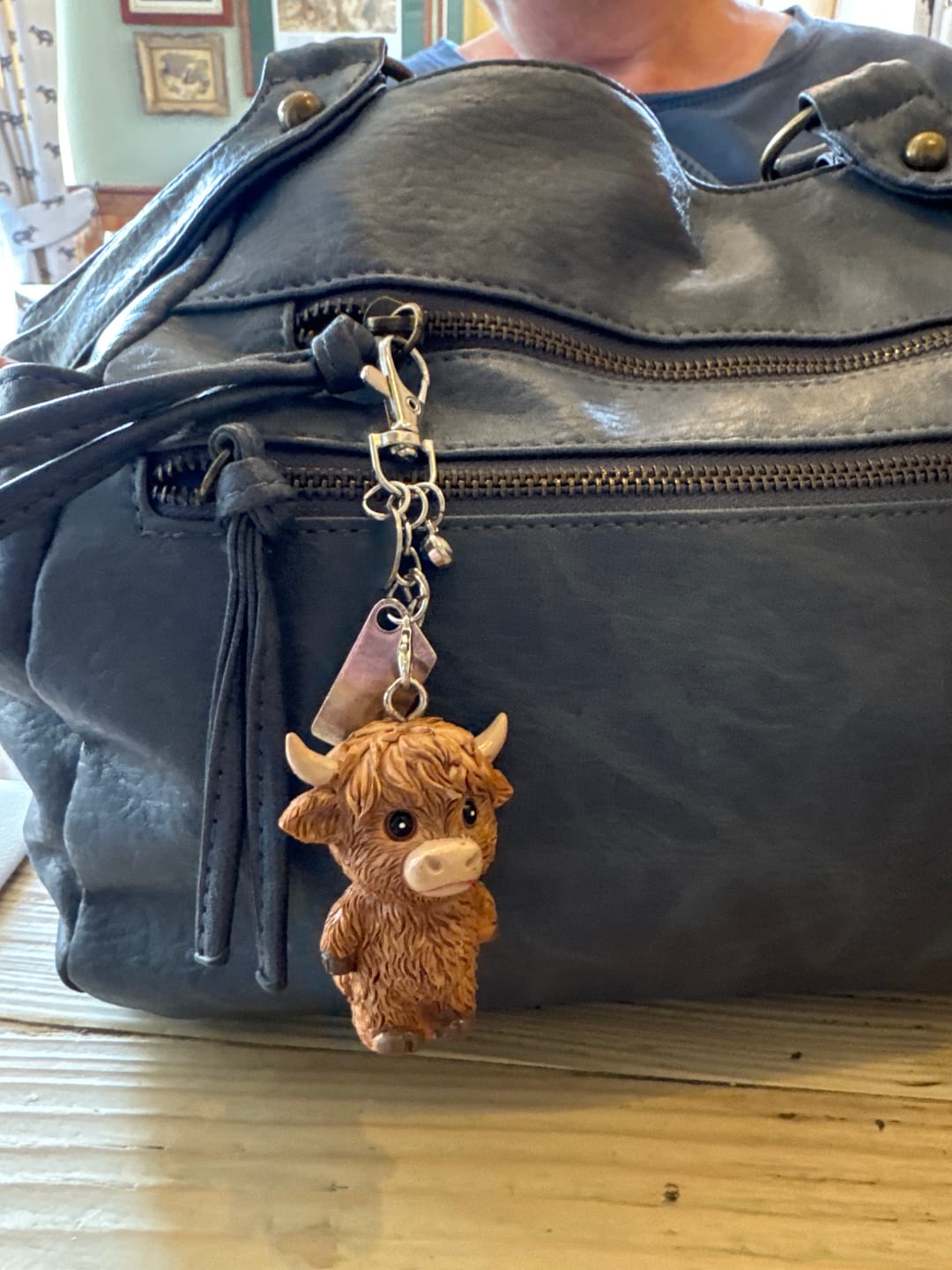 Customer photo review of 🐮A Little Highland Cow For You Keychain: Your Daily Reminder of Quiet Strength