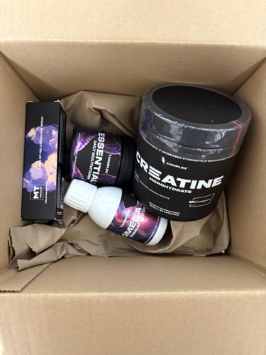 Customer's Omega 3 Premium Fish Oil in a shipping box with other supplement products.