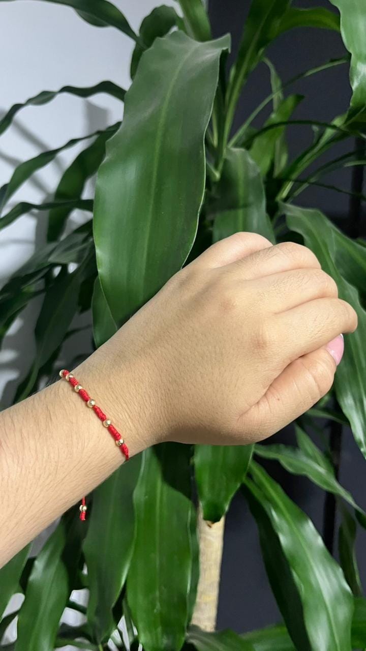 Customer photo review of Pulsera protección 7 Nudos Oro Laminado 18K ✨