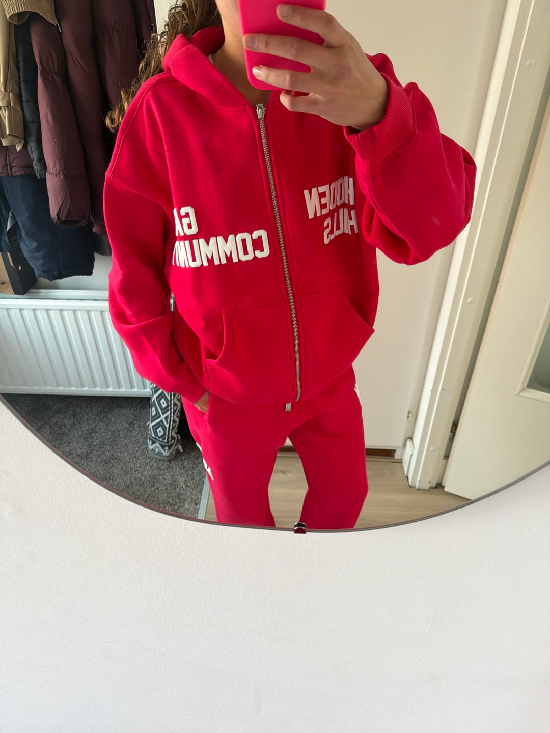 Customer photo review of the GATED COMMUNITY ZIP HOODIE in RASPBERRY RED