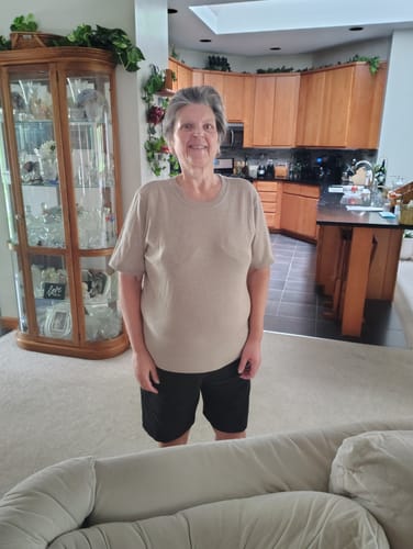 Reviewer wearing the short-sleeved Anna top in Sandstone Haze from a Mystery Item purchase.