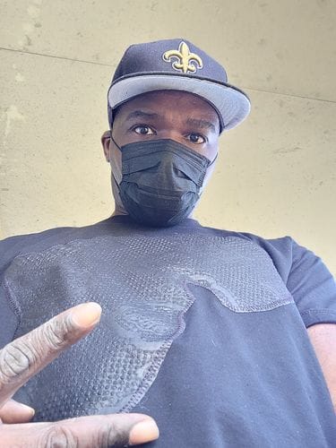 Customer photo review of "Akwaaba" Black & Black Ankara Africa Tee