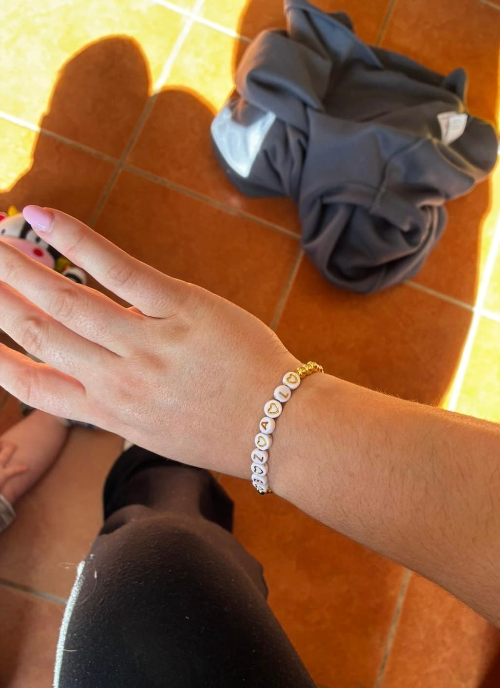 Customer photo review of Custom Friendship Bracelet Gold - Gold & White