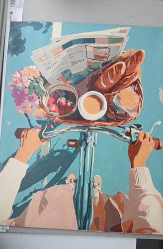 Customer's completed 'Early ride' Paint by Number canvas, showing a colorful bicycle scene from a first-person view.