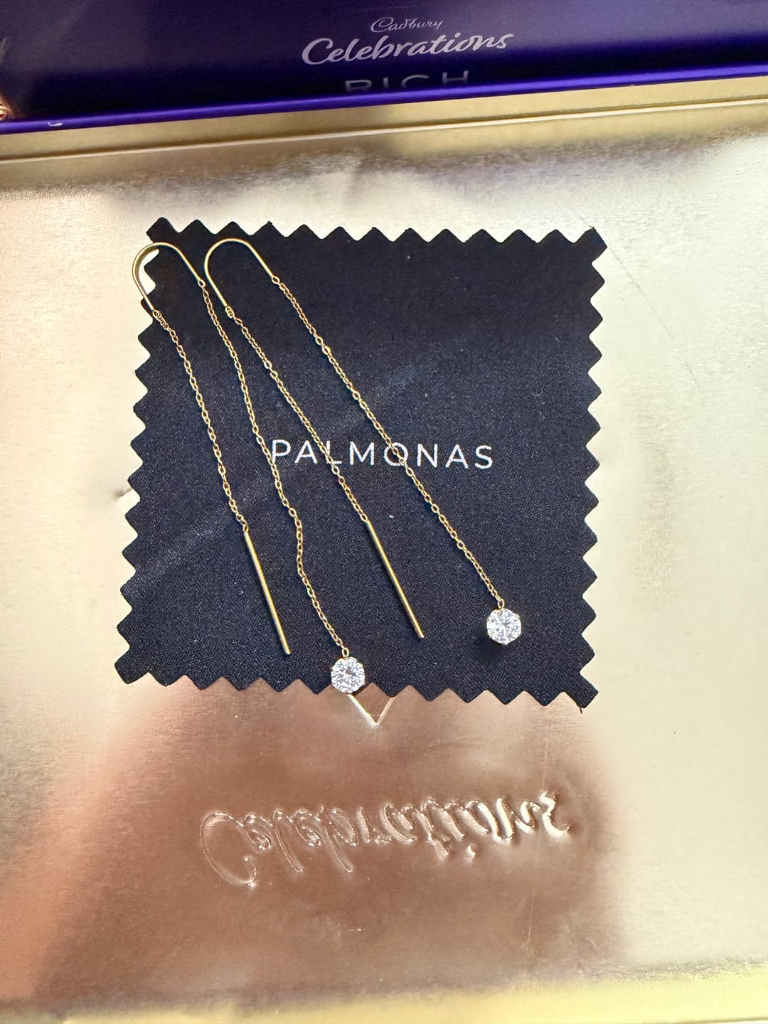 Customer photo review of Crystal Tip Glide Chain Dangling Earrings