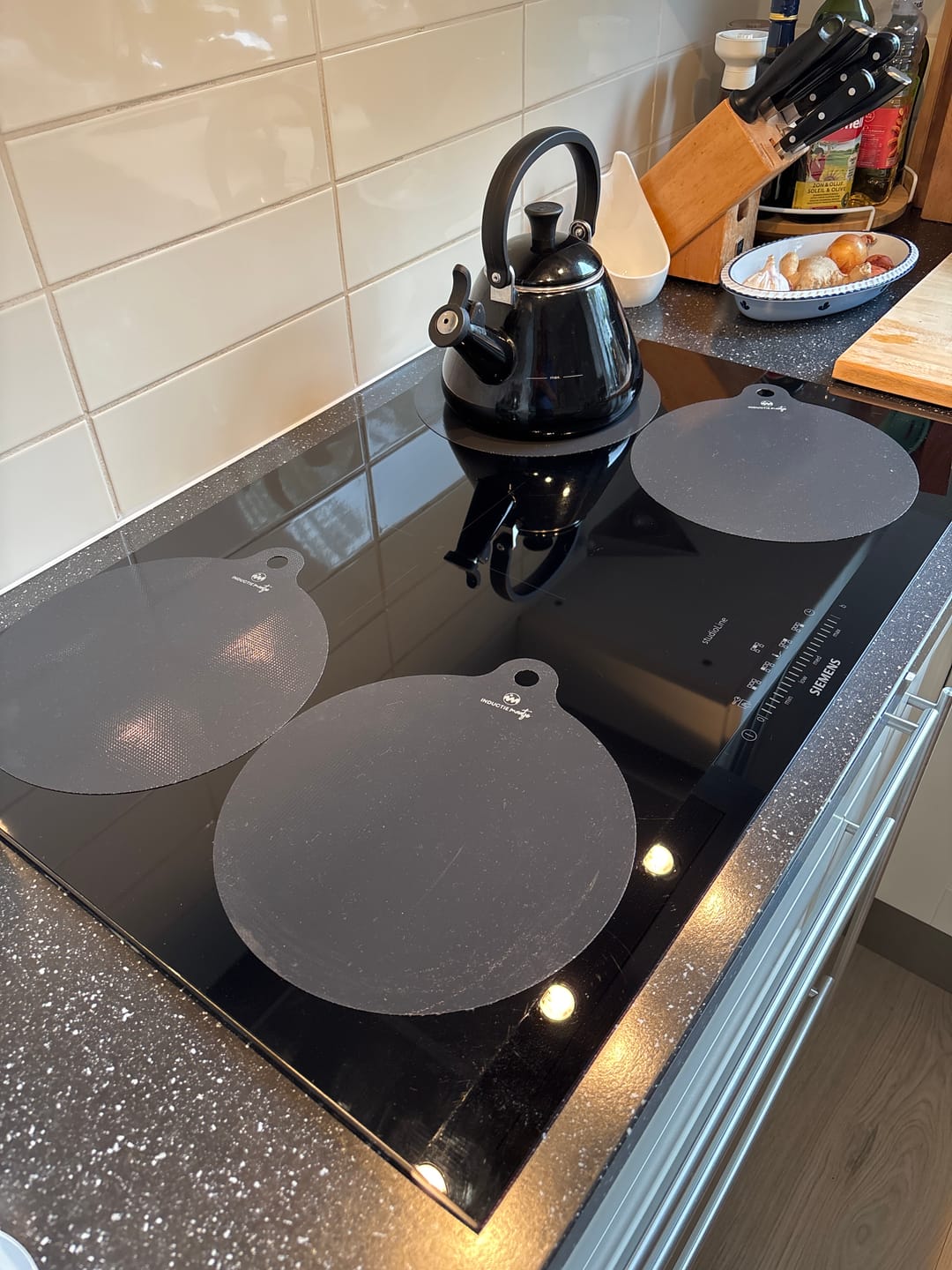 Customer photo review of Inductie matjes set van 4 - Zwart - 4xØ25cm