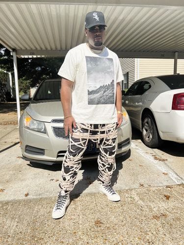 Customer photo review of "Ominira" Black and Neutral Laced Up Pants