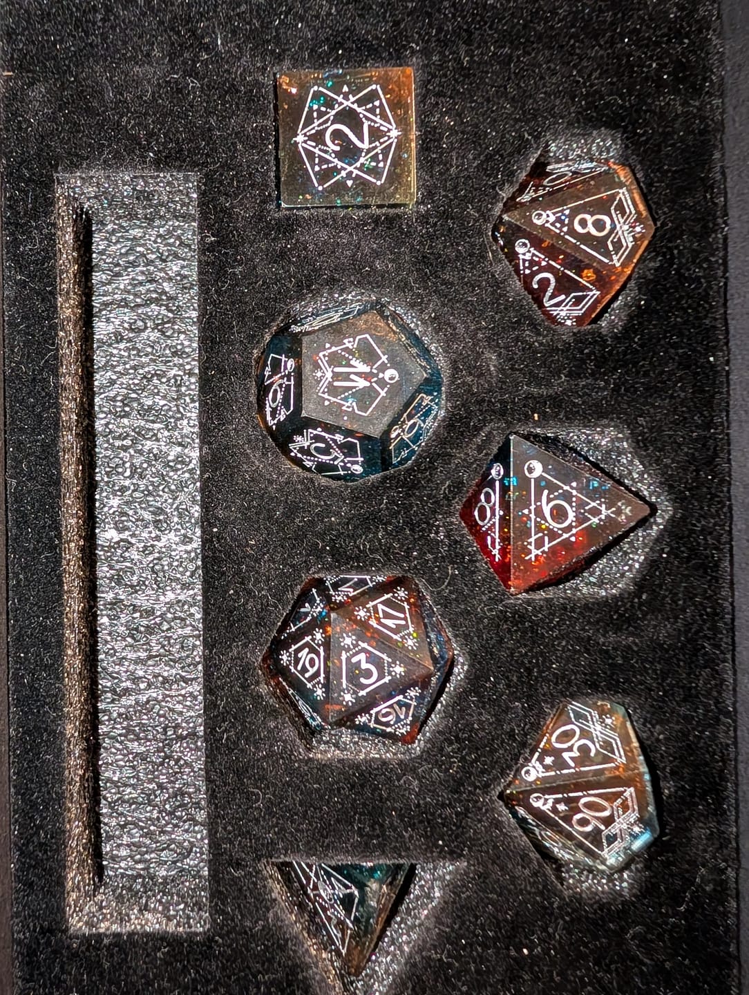 Customer photo review of URWizards D&D Resin Dawn Glitter Engraved Dice Set Astrology Style