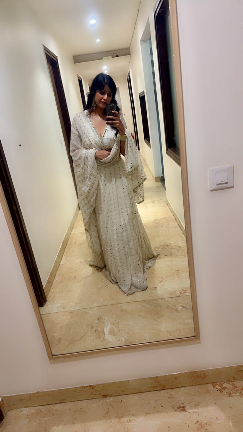 Customer photo review of Astoria Ivory Mirror Work Lehenga Set