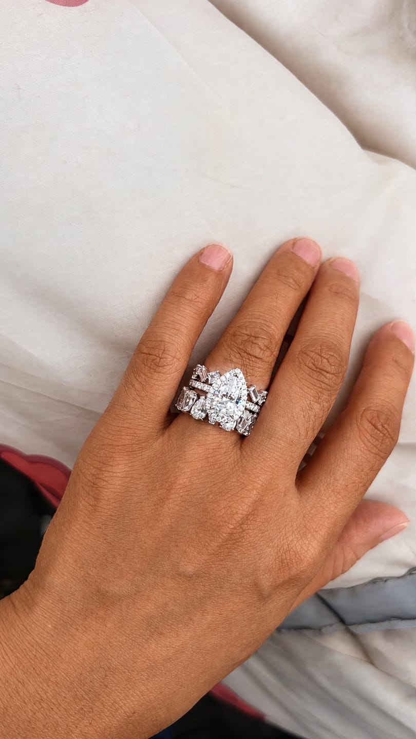 Customer photo review of S925 2.2 Carat Halo Pear Cut Wedding Ring Set With Two Luxurious Wedding Bands For Women